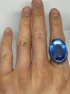 Large brilliant Blue antique glass Ornate German Silver Vintage ring, does not tarnish Size 9 can be adjusted by my jeweler. He charges $10-$20 All rings are shipped in a nice gift box. Check out our over a THOUSAND great reviews Engraving is $4 per letter and is not always perfect depending on the piece. It can take a few days if the jeweler is busy. This is payable to Paypal Judithsltd@gmail.com Handmade Sapphire Crystal Ring Gift, Adjustable Blue Topaz Gemstone Ring, Adjustable Blue Crystal Gemstone Ring, Blue Moonstone Open Ring, Unique Blue Crystal Ring For Anniversary, Unique Blue Crystal Promise Ring, Blue Cabochon Topaz Ring For Anniversary, Blue Moonstone Open Ring Gift, Handmade Blue Crystal Ring In Sterling Silver