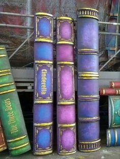 several books are stacked on top of each other