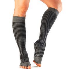 Knee high grip socks are the perfect stylish accessory for barre or pilates. Wear them high for a sexy knee-high look, or scrunch them low for a ballet-inspired leg warmer look. Patented non-slip grip keeps your feet in place Half toe design lets toes touch surface for a more barefoot experience Five toe design allows toes to move and spread naturally Hygienic alternative to bare feet Arch support band gently lifts and supports Fitted heel keeps sock in place to eliminate bunching and twisting M Pilates Wear, Club Pilates, Barre Socks, Barre Pilates, Pilates Barre, Leg Warmer, Yoga Socks, Barre Workout, Pilates Yoga