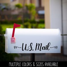 a mailbox with the word u s mail on it and a red arrow sticking out of it