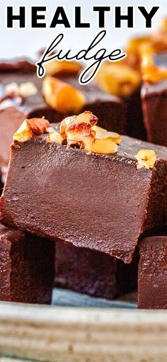 chocolate fudge cake on a plate with the words healthy fudge in front of it