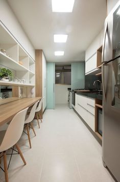 the kitchen is clean and ready to be used for cooking, dining or as an office