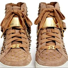 Michael Kors Keaton Brown Studded And Perforated Suede High-Top Sneakers Size 5.5m High-Top Snickers - Timeless Chic Quilted And Perforated Suede With Golden Allover Studs 100% Suede Upper / 100% Rubber Sole Round Toe Back Zips Allow Easy On And Off Lovely And Adorable, Uptown Edge Sneakers Shoes Limited Production Gold-Tone Logo Engraved Plate With Textile Hook-And-Loop Fastening Gold-Tone Studs Allover Suede Upper Color: Brown/Tan With Gold Metal And White Heel: 3cm True To Size Chic Quilts, Engraved Plates, Timeless Chic, White Heels, Suede Sneakers, Michael Kors Shoes, Sneakers Shoes, Womens Shoes Sneakers, High Top