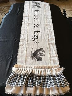 a black and white table cloth with words on it