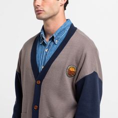 This is where it all began! The Vox Machina Varsity Cardigan was designed with love and respect for details to help you stay warm and cozy whether you're revisiting the highs of Campaign 1 or heading out for adventures of your own. Vox Machina patch on the front chest Vox Machina campaign patch on the sleeve Critical Role icon patch on the front pocket Chenille embroidered Vox Machina emblem on the back Sweater Knit: 50% rayon, 30% nylon, 20% recycled polyester 2 front pockets 4 button closure I Long Sleeve Outdoor Cardigan, Cozy Long Sleeve Cardigan For Outdoor, Casual Fall Cardigan For Outdoor, Casual Fall Outdoor Cardigan, Retro Winter Outerwear For Layering, Retro Winter Layering Outerwear, Long Sleeve Cardigan For Fall Outdoor, Long Sleeve Fall Cardigan For Outdoor, Fall Outdoor Cardigan With Pockets