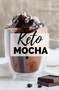 a close up of a cup of coffee with chocolate on the side and text overlay reading keto mocha