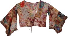 Exotic and one of a kind, this crop top is a unique one with its bell sleeves, printed patchwork, front tie and the choco brown sprinkling.  The patchwork has varied floral and geometric random patterns - each piece is unique. #tlb #Patchwork #vacationclothing #beachwrap #Floral #Printed #Paisley #bohemianfashion #70sfashion #70shippietop Brown Cotton Patchwork Tops, Bohemian Brown Crop Top, Fitted Bohemian Brown Crop Top, Brown Bohemian Crop Top For Spring, Bohemian Brown Crop Top For Spring, Bohemian Cotton Tops With Mixed Print, Bohemian Cotton Mixed Print Tops, Bohemian Brown Cotton Crop Top, Hippie Fitted Patchwork Tops