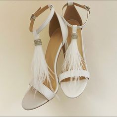 Change up your shoes! A pair of pale Ivory feather shoe tassels with diamante sparkle! Made so you can slide the tassel onto a strap, works best on an ankle strap shoe. Made in our Hampshire studio (U.K.) We can make these in black too!  Does NOT include shoes (By the way the shoes are from Pretty Little Thing) Post & (pretty!) packaging inc for U.K. only If you are looking for different colour feather tassels drop us a line. Feather Shoes, Tassel Shoes, Blue Bridal, Ankle Strap Shoes, Shoes Wedding, Bow Shoes, Womens Wedding Shoes, Shoe Clips, Ankle Strap Sandals