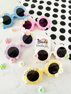 Adorable sunnies for blocking the sun ! Personalized and adorable for any little cutie ! Playful Yellow Sunglasses For Beach, Playful Multicolor Sunglasses For Spring, Playful Flower-shaped Plastic Sunglasses, Cute Flower Shaped Sunglasses With Uv Protection, Playful Multicolor Sunglasses For Beach, Cute Spring Sunglasses With Gradient Lenses, Cute Sunglasses With Gradient Lenses For Spring, Playful Sunglasses For Beach In Spring, Cute Adjustable Sunglasses For Spring