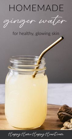 homemade ginger water for healthy, glowing skin in a glass jar with a gold straw