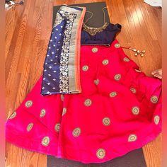 It Comes With A Beautiful Work Blouse You Can Adjust And Tie In The Back The Skirt Is Dark Pink With Embroidered Mandala Designs The Scarf Is Silky And Has Beautiful Designs Stitched On It It Will Fit Teenagers And Adults Who Are 4’11 Or More Message Me With Questions If Needed Pink Party Skirt With Traditional Drape, Diwali Embroidered Skirt, Embroidered Fitted Skirt With Traditional Drape, Fitted Skirt With Traditional Drape And Embroidery, Pink Silk Skirt For Wedding, Traditional Skirt With Dori Work, Traditional Dori Work Skirt, Pink Embroidered Skirt For Parties, Embroidered Pink Skirt For Party