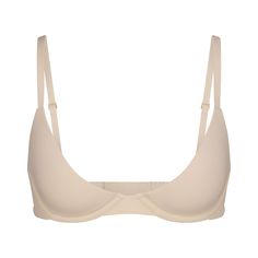 This lightly lined, buttery-soft scoop bra is engineered for an ultra-comfortable, barely-there fit with innovative cup technology to fit in between sizes. Features flexible, supportive underwire, adjustable straps, and hook and eye back closure. Fits true to your SKIMS bra size. | SKIMS Plunge Bra | Light Neutral | 32C | Fits Everybody Fitted Nursing Bra With Removable Pads For Everyday, Classic Seamless Bra, Classic Seamless Solid Bra, Classic Seamless Solid Color Bra, Bra With Removable Pads And Minimal Stretch, Everyday Solid Bra With Adjustable Straps, Classic Underwire Bra With Soft Touch, Everyday Fitted Bra With Medium Bust Support, Everyday Seamless Underwire Bra