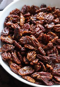 pecans in a white bowl on a table