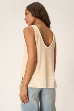 Only accepting weekend vibes moving forward.The Weekend Vibes Sweater Rib Tank is your new warm-weather BFF. It features a delicate knit fabric and a relaxed, long-line silhouette that is perfect for styling an easygoing look. A scoop neckline, side slits, and exposed seaming throughout add extra little details that will make this a style favorite this season. 46% Polyester45% Rayon7% Spandex Care Instructions: Machine wash cold. Wash inside out with similar colors. Do not bleach. Lay flat to dr V-neck Pointelle Knit Tops For Loungewear, Versatile Relaxed Fit Knit Top For Loungewear, Casual Summer Tops With Soft Texture, Chic Soft Knit Tops For Loungewear, Ribbed Summer Sweater For Day Out, Beige Knit Top For Loungewear, Chic Relaxed Fit Knit Top For Everyday, Oversized Relaxed Knit Tops, Chic Soft Knit Top With Relaxed Fit