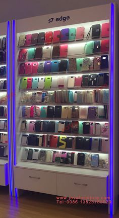 there are many cell phones on display in the store