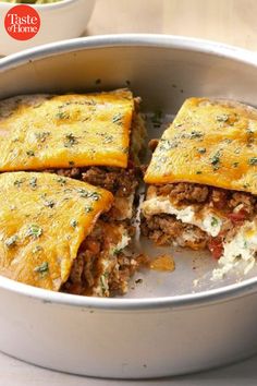 a pan filled with food sitting on top of a table