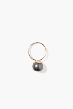 A sparkling gold wrapped diamond slice creates a mesmerizing contrast against a black Tahitian pearl on this 14k gold ring. 14k yellow gold, .02ct diamond slice, black Tahitian pearl. 16" in length. Handmade in Vietnam. Pearl Wedding Bands, Iris Ring, Black Pearl Ring, Tahitian Black Pearls, Gold Wrap, Handmade Box, Tahitian Pearls, 14k Gold Ring, Bora Bora