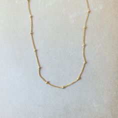 Our Satellite Chain Necklace is dainty and adds just a bit of texture. A perfect everyday necklace that looks lovely on its own and can easily layer with your other favorite necklaces. Minimalist Charm Necklace With Delicate Link Chain, Minimalist Link Charm Necklace With Delicate Chain, Simple Jewelry With Delicate Link Chain, Everyday Charm Necklace With Delicate Link Chain, Dainty Chain Link Necklaces For Everyday, Simple Everyday Jewelry With Delicate Chain, Minimalist Snake Chain Charm Necklace For Everyday, Dainty Everyday Chain Necklace, Minimalist Chain Necklace With Delicate Chain For Layering