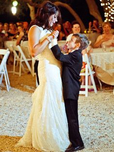 a bride and groom sharing their first dance