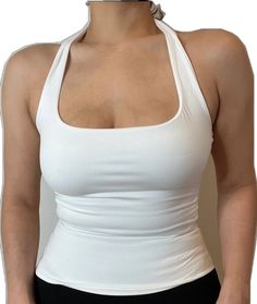 Stretch Sleeveless Halter Top With Built-in Bra, Sleeveless Halter Top With Built-in Bra For Workout, White Halter Neck Camisole With Built-in Bra, Stretch Sleeveless Halter Top, Spring Workout Halter Neck Tank Top, White Stretch Halter Neck Tank Top, Chic White Racerback Tank Top, White Fitted Tank Halter Top, Fitted White Tank Halter Top