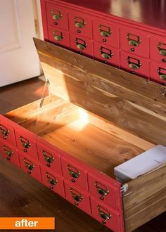 a red chest with many drawers in it