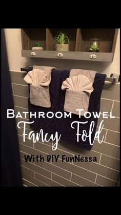 bathroom towel fancy fold with diy funnessa on the wall above it is an easy and cheap way to keep your towels clean