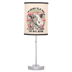 a lamp with a cow on it that says, i'm having dea now