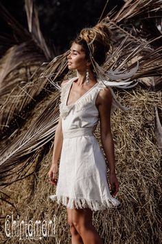 Gorgeous Off White Bohemian Mini Dress with deep beautiful V shape neck line and fringes made of 100% cotton jacquard thick fabric. As elegantly simple as it can be, this goddess dress will compliment your feminine Divinity in a most subtle way. The silhouette is shaped with cotton canvas belt