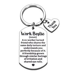 a keychain with the words work bettie and heart shaped charms on it