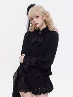 Add a touch of dark elegance to your wardrobe with this gothic black shirt featuring a charming spider charm decorated bowtie. The long sleeves with button cuffs and flounce create a striking and unique look that is perfect for any occasion.   	 		 			Size 			S 			M 			L 			XL 		 		 			Full Length 			54 			55 			56 			57 		 		 			Bust 			92 			96 			100 			104 		 		 			Shoulders 			36 			37 			38 			39 		 		 			Neck 			40 			41 			42 			43 Long Sleeve Gothic Blouse For Formal Occasions, Black Gothic Blouse For Formal Occasions, Formal Gothic Long Sleeve Blouse, Black Long Sleeve Gothic Blouse, Black Gothic Long Sleeve Blouse, Black Gothic Blouse For Fall, Gothic Party Tops With Buttons, Elegant Tops For Halloween Costume Party, Elegant Long Sleeve Blouse For Costume Party