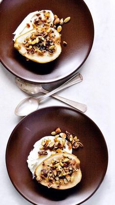 two brown plates topped with desserts on top of a table