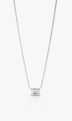 Elegant and enchanting, this emerald cut diamond necklace embodies timeless sophistication. Set in lustrous 14K white gold and a 4-prong setting, the E/F color and VS clarity of this sustainable, lab-grown, .51 carat diamond exude a pristine brilliance. A symbol of refined luxury and enduring glamour that's perfect for layering to add a touch of sparkle to any ensemble. *Note: 7 day return for store credit only. No exchanges allowed. Product Details .51 Carat Emerald Cut Bezel Tennis 16.5" Neckl Bridal Wardrobe, White Gold Pendant Necklace, Streetwear Chic, Emerald Cut Diamond, Note 7, Fine Jewelry Collection, Emerald Cut Diamonds, East West, Swimwear Sale