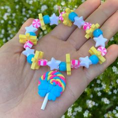 Lollipop charm is made from soft clay Candy Accessories, Blue Lollipop, Scene Room, Kandi Inspo, Diy Kandi Bracelets, Silly Clothes, Emoji Drawings, Diy Kandi, Hat Aesthetic