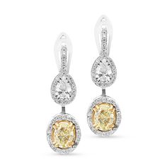 Take her breath away with these stunning diamond and fancy yellow diamond drop earrings that are sure to offer incomparable beauty and unmatched quality. Expertly crafted in 18K white and yellow gold, each eye-catching double-drop design features a shimmering canary yellow oval-shaped diamond in a yellow gold setting surrounded by a white diamond halo. Atop is a glistening pear-shaped brilliant-cut diamond in a pave-lined halo hanging from a diamond-adorned post. Radiant with Luxury Yellow Diamond Drop Earrings, Luxury Yellow Diamond Earrings For Wedding, Luxury Yellow Diamond Cut Earrings, Elegant Yellow Diamond Earrings With Halo Design, Formal Yellow Diamond Earrings With Diamond Cut, Elegant Yellow Diamond Earrings, Yellow Diamond Earrings For Formal Occasions, Formal Yellow Diamond Cut Earrings, Formal Yellow Diamond Earrings