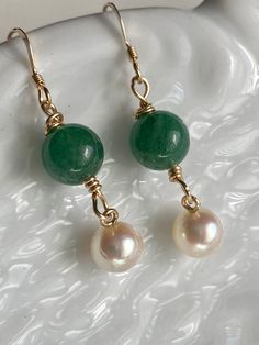 These vintage Baroque teardrop pearls are from the estate of a jeweler in Connecticut that I picked up last year on my New England buy. These are from the 1980's according to the label on the sleeve. Gorgeous creamy white iridescent nacre. The 8mm hand carved Brazilian emeralds are new. 14k gold filled filled beads, on 14k gold filled ear wires earrings Stamped are made in the USA. Green Pearl Jewelry For Gifts, Pearl Drop Round Beads Jewelry For Anniversary, Pearl Drop Jewelry With Round Beads For Anniversary, Classic Handmade Pear-shaped Jewelry, Round Akoya Pearl Bead Jewelry As A Gift, Classic Green Pearl Drop Jewelry, Green Pearl Drop Jewelry As Gift, Green Round Classic Pearl Earrings, Green Pearl Drop Jewelry For Gifts