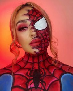 This Spider-Man-inspired makeup adds a unique twist to the classic superhero look. The artist has created a half-human, half-Spider-Man design, showcasing the transformation from everyday person to superhero. The red and black web pattern is expertly painted, blending seamlessly into the natural skin tone on the other side of the face.   Photo credit by: @sydneypurl Marvel Makeup Ideas, Spider Man Makeup, Spider Man Face Paint, Marvel Makeup, Green Face Paint, Black Face Paint, Face Makeup Ideas, White Face Paint