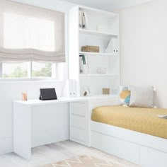 a bedroom with a bed, desk and bookshelf next to a window in the room