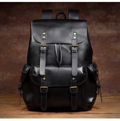 With genuine leather and vintage appearance,this backpack will never go out of style.This backpack is made using high-quality materials and elaborate craftsmanship.It has multipurpose design and is the perfect gift for your friends.  This leather backpack mens gender-neutral and very classy-looking. You can use it for your college, travel or business, People will go crazy about this bag everywhere you go. 
 
The large capacity design makes this vintage backpack can meet the needs of daily life and work. It can securely protect your 16 inch computer, more pockets design allows you to easily carry your wallet, cell phone, sunglasses and other items. 
 
     ITEM FEATURES  - 1 x Main Compartment 
- 1 x Laptop Compartment 
- 1 x Front Pocket 
- 1 x Interior Zipper Pocket 
- 2 x Slot Pockets 
- Vintage Leather Backpack With Large Capacity, Vintage Leather School Backpack, Vintage Black Satchel Backpack, Black Vintage Satchel Backpack, Vintage Black Backpack, Vintage Leather Travel Backpack, Vintage Black Leather Backpack For Daily Use, Black Vintage Leather Backpack For Daily Use, Vintage Black Leather Backpack