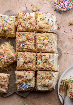 several pieces of cake with sprinkles on top