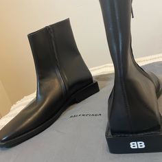 Balenciaga Bb Rim Square Heel Boots 616349. Like Brand New. Only Worn Once. Comes With A Dustbag, But No Box. Size Is 37.5 (Men) European Size / 7 (Men) Us Size Designer Almond Toe Business Boots, Designer Fitted Boots For Business, Designer Square Toe Office Boots, Designer Fitted Square Toe Boots, Designer Boots For Formal Occasions, Designer Formal Boots, Square Heel Boots, Balenciaga Heels, Shoes Balenciaga