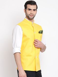 VASTRAMAY Men's Yellow Solid Classic Royal Cotton Blend Nehru Jacket The VASTRAMAY Men's Yellow Solid Classic Royal Cotton Blend Nehru Jacket combines traditional style with modern comfort, making it an ideal choice for various occasions. Features of VASTRAMAY Men's Yellow Solid Classic Royal Cotton Blend Nehru Jacket Features a solid yellow color for a vibrant and sophisticated look. Classic Nehru jacket design with a timeless appeal. Made from a high-quality cotton blend for superior comfort a Casual Cotton Nehru Jacket For Winter, Traditional Cotton Outerwear For Work, Cotton Nehru Jacket With Stand Collar For Winter, Winter Cotton Nehru Jacket With Stand Collar, Traditional Outerwear With Stand Collar For Work, Traditional Nehru Jacket For Spring Workwear, Casual Fitted Nehru Jacket For Spring, Traditional Nehru Jacket With Stand Collar For Work, Classic Nehru Jacket With Stand Collar For Festive Occasions