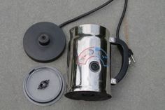 an image of a coffee mug and other items on the ground with a cord attached to it