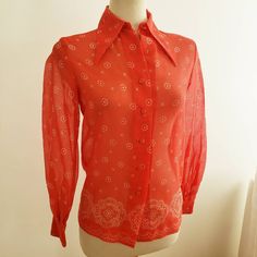 "This one is quite a find. Reminds you of a red bandana. The collar is pointed and the buttons are covered by fabric.  Late 60s Early 70s Piece.  Estimates Size Small - maybe Medium. Please refer to measurements below: NOTE: One button on the cuff IS MISSING! This one is by Joseph Magnin. Not familiar? Check the photos. bust = 18\" across waist = 17.5\" across Hips = 17.5\" across" Joseph Magnin, Red Bandana, Red Long Sleeve, Lovely Dresses, Vintage Clothing, Womens Clothing Tops, Red Leather Jacket, Floral Tops, Sleeveless Top