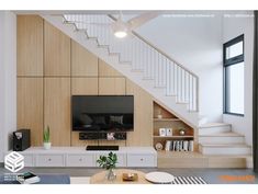 a living room filled with furniture and a flat screen tv sitting on top of a wooden shelf