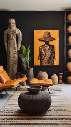 the living room is decorated in black and brown tones with leather chairs, vases, and artwork