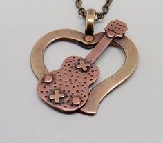 "Cool steampunk pendant . The size is 1 1/4\" by 1 1/2\" and it has 24\" antique brass chain. All my jewelry come in a nice gift box." Retro Metal Jewelry For Gifts, Retro Metal Jewelry For Gift, Punk Heart Pendant Necklace As Gift, Punk Heart Pendant Necklace For Gift, Punk Style Heart Pendant Necklace For Gift, Punk Pendant Necklace For Gift, Retro Brass Pendant Jewelry, Punk Style Pendant Necklace For Gift, Retro Nickel-free Necklaces For Gifts