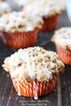 cupcakes with white frosting and crumbs on top