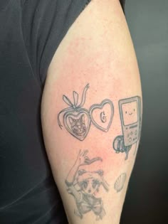 a person with a tattoo on their arm that says i love you and two hearts