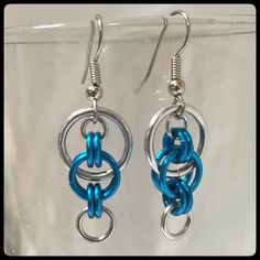 Blue And Silver Tone Chainmail Earrings. Handmade From Aluminum Rings And Surgical Steel Ear Wires. Super Lightweight! New - Never Worn. Will Be Delivered To You On An Earring Card - Perfect For Gift Giving! Blue Hypoallergenic Metal Jewelry, Blue Dangle Earrings Cadmium-free, Chainmaille Jewelry Patterns, Chainmail Earrings, Anodized Aluminum Jewelry, Jump Ring Jewelry, Beaded Dragonfly, Chainmail Jewelry, Aluminum Jewelry