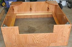 a wooden bench being built in a garage